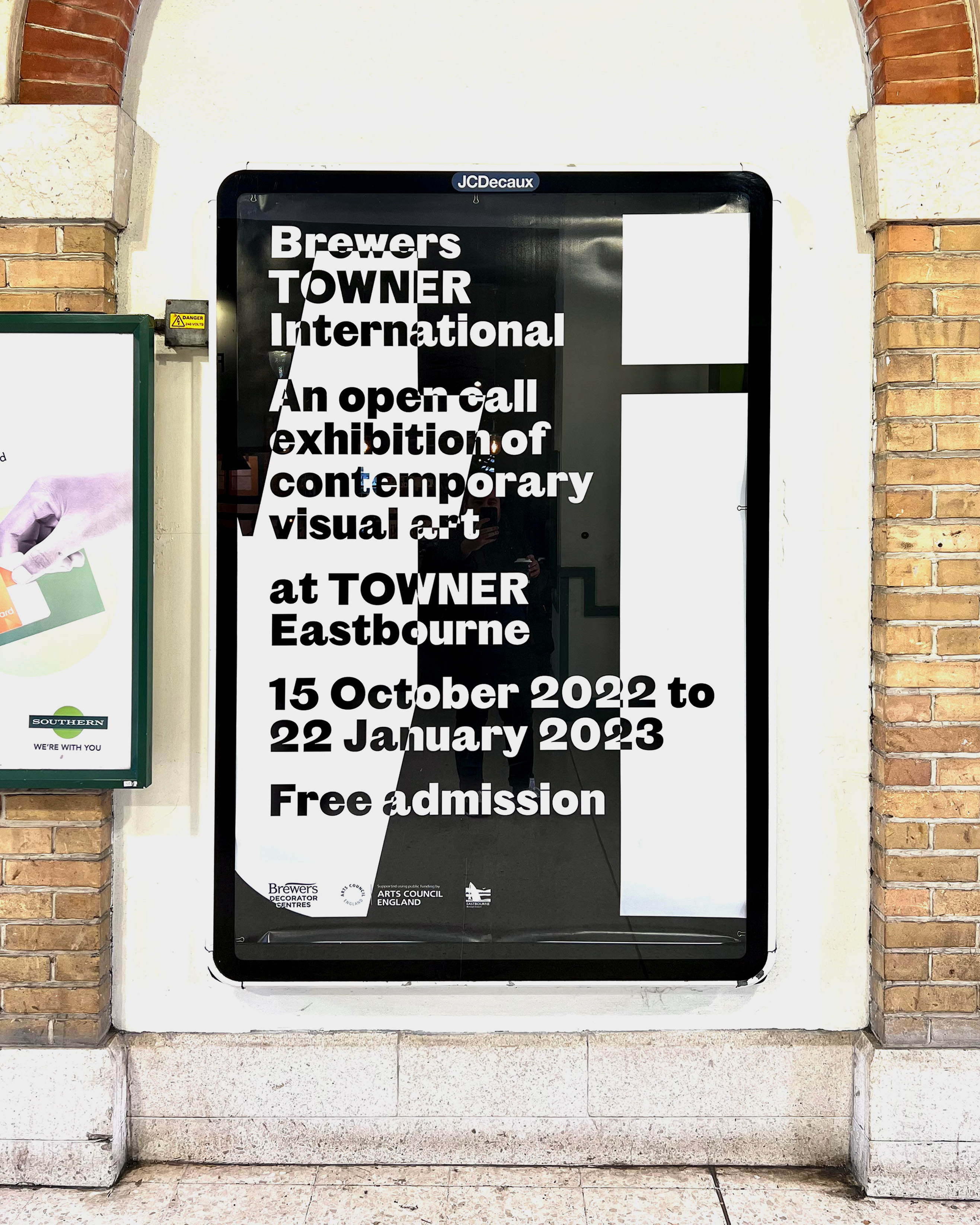 A Brewers Towner International poster in London Victoria station.